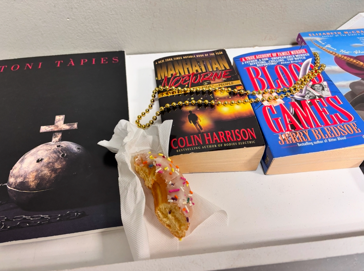 Unfinished donut among Free books